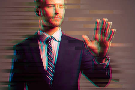 smart caucasian businessman hand touch invisible screen isolate background with illusion creative...