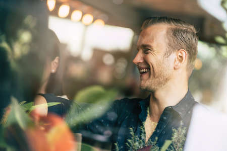 group of multi nation friends enjoy conversation with fun and happiness meeting business casual...