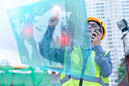 front view of professional engineer asian male safety helmet manage control constuction site with...