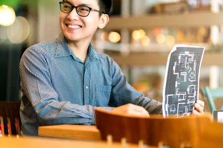 asian businessman startup company   entrepreneur  sit smile with happiness in new shop store office...