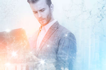 Businessman innovation success concept with virtual connecting line double exposure city building backgroundの写真素材