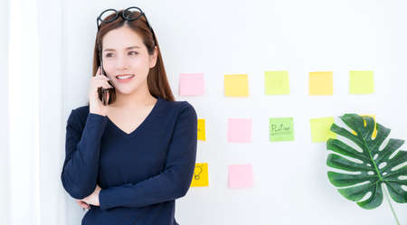 beautiful asian influencer designer working with cheerful and enthusiastic business entrepreneur ...