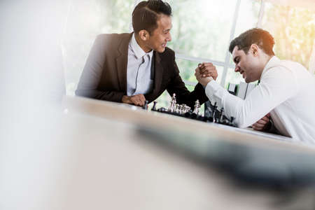business competition ideas concept two business man hand fight on desk strategy and organize method