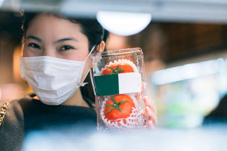 new normal after covid epidemic young smart asian female shopping new lifestyle in supermarket with...