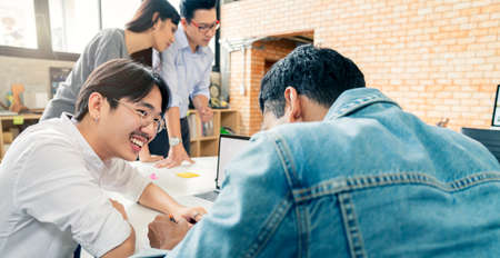 Group of colleagues having an informal meeting ,Business people discussing ideas in office