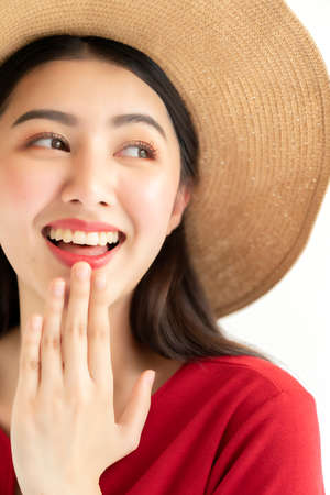 beautiful happiness asian teen woman red dress wear rattan hat summer travel vacation concept white backgroundの写真素材