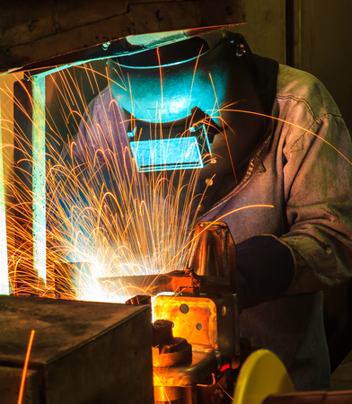 Welder movement Industrial automotive part in factory