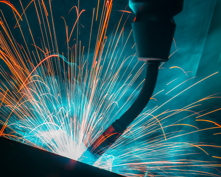 Welding robots movement in a car factoryの写真素材