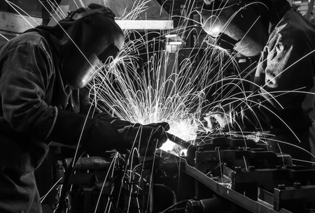 welder Industrial automotive part in factory black white