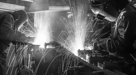 welder Industrial automotive part in factory black white