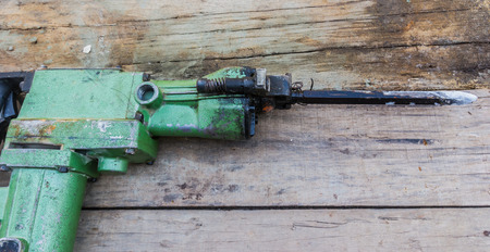 Electric hammer Plugger on old wood