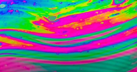 Rainbow colors created by soap bubble can use for background