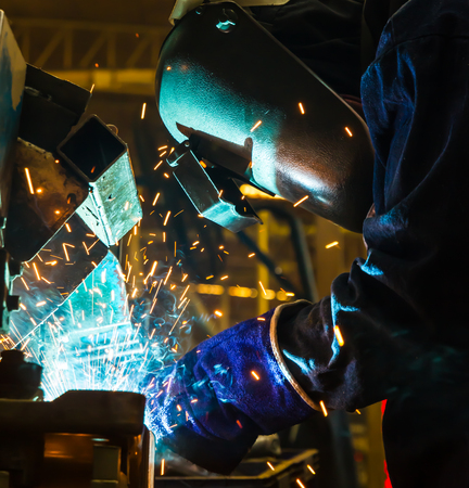 Welding work Industrial automotive part in factory