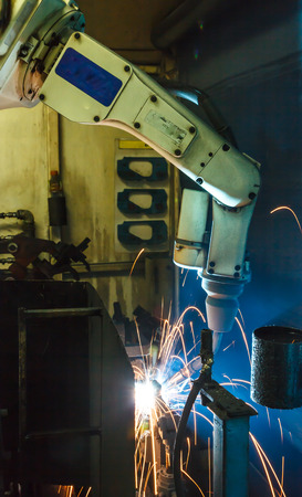 Welding robots movement in a car factory