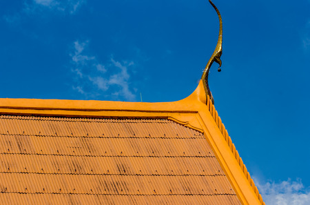 Detail of a traditional buddhist temple roof in thailandの写真素材