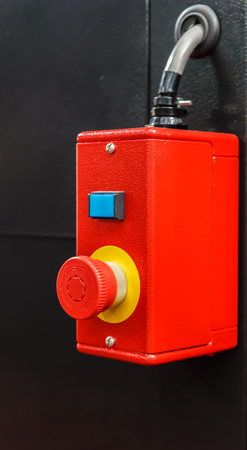 Red Emergency switch button, in industrial plantsの写真素材