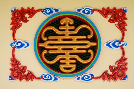 The colorful wall in the Chinese style temple , Thailandの写真素材