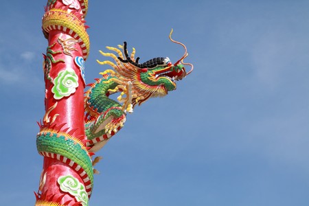 chinese dragon with blue sky background.の写真素材