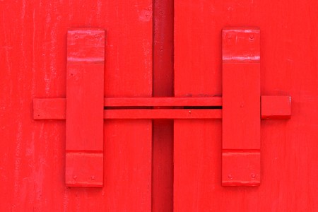 Thai native Red door with lock. の写真素材