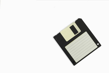 old floppy disk isolated on white backgroundの写真素材