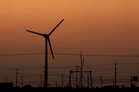 Wind turbine silhouette on twilight skyの写真素材