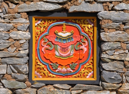 Traditional Bhutanese style Art on window in ancient temple の写真素材