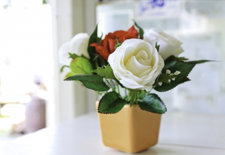 Beautiful Decorative flower  on the wood tableの写真素材