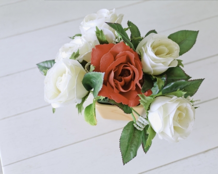 Beautiful Decorative flower  on the wood tableの写真素材