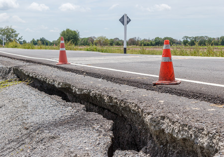 Collapsed Asphalt Road Cracked and Broken.の写真素材