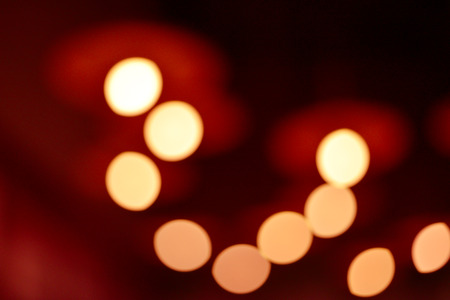 Red background, light of the lamp, nightの写真素材