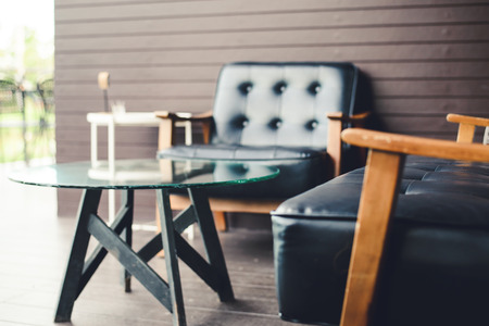 Sofa Table, Black Leather Front of houseの写真素材