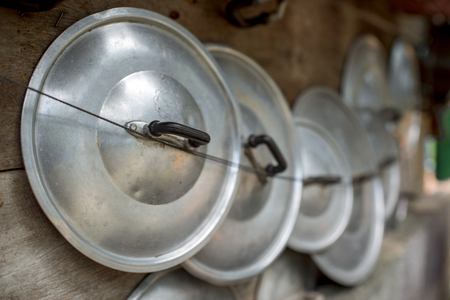 Pot lid hanging on the lid.の写真素材