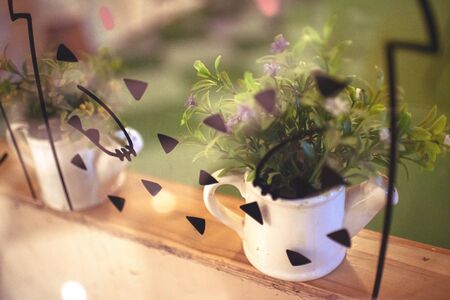 Ornamental flowers in the restaurant, placed at the edge of the balconyの写真素材
