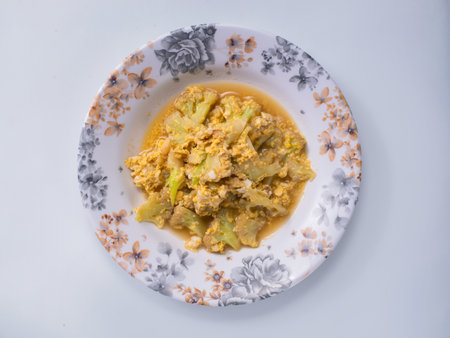 Thai food, is stir-fried, not spicy, consisting of eggs and vegetables. white backgroundの写真素材