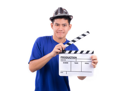 Man with clapboard film slate on a white background.の写真素材