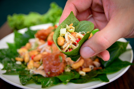 Pork and cashews wrapped in Chaplo  delicious of Thaifood.の写真素材