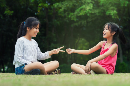 Little sisters is Rock-Paper-Scisors for funの写真素材