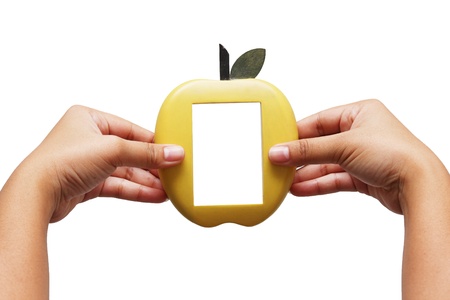 Frame apple in hand,Apple, maker of woodの写真素材