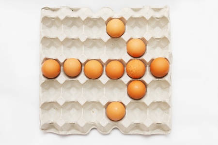 eggs in cardboard container,Arrow