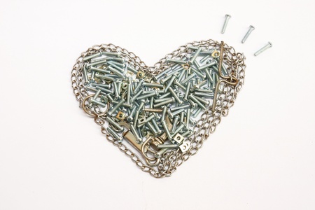 nuts and bolts heart on white background 