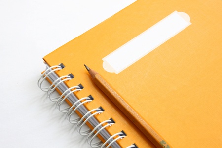 yellow Notebook with pencilの写真素材