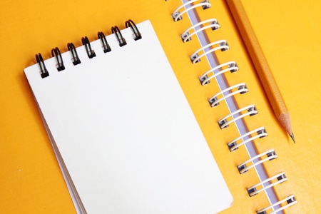 yellow Notebook with pencilの写真素材