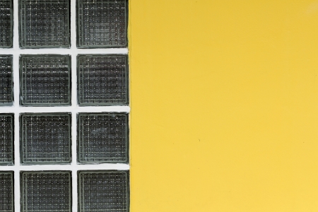Glassblock and yellow wall backgroundの写真素材