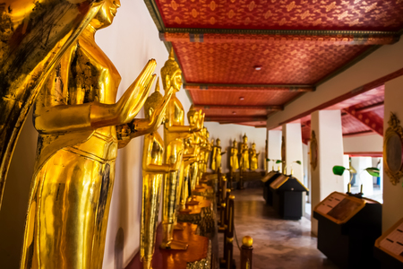 Landmark, Close Up Beautiful Everybody faces to the left,Golden statue Temple Wat Pho in Asia Bankok Thailand 2017のeditorial素材
