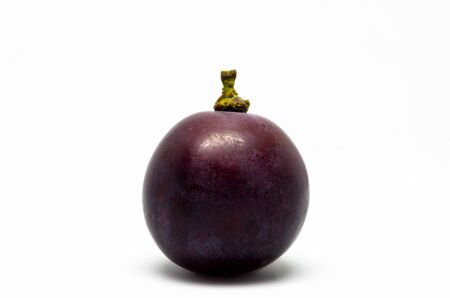 Close Up of Ripe purple grape sweet fruit. isolated on white.の写真素材