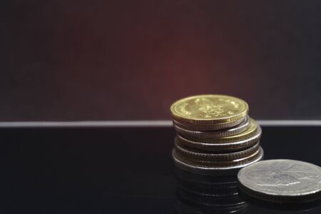 Thai baht money coins stacked. saving concept  With copy space style dark