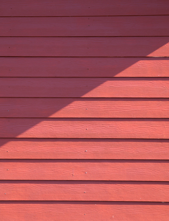 Red Artificial Wood Texture on Shadow Areaの写真素材