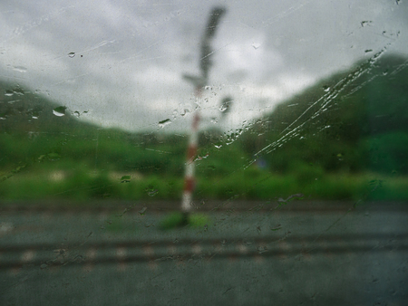 Blur of Abstract Rainfall on The Mirror Image Train
