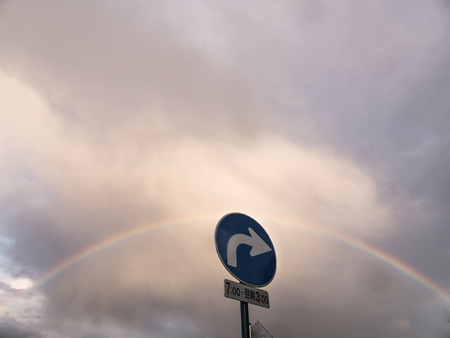 Sign Symbol Traffic Turn Right at The Rainbow on The Top in Hokkaidoの写真素材