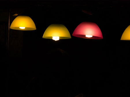 The Multiple Colors Lamp Hanging in The Nightの写真素材